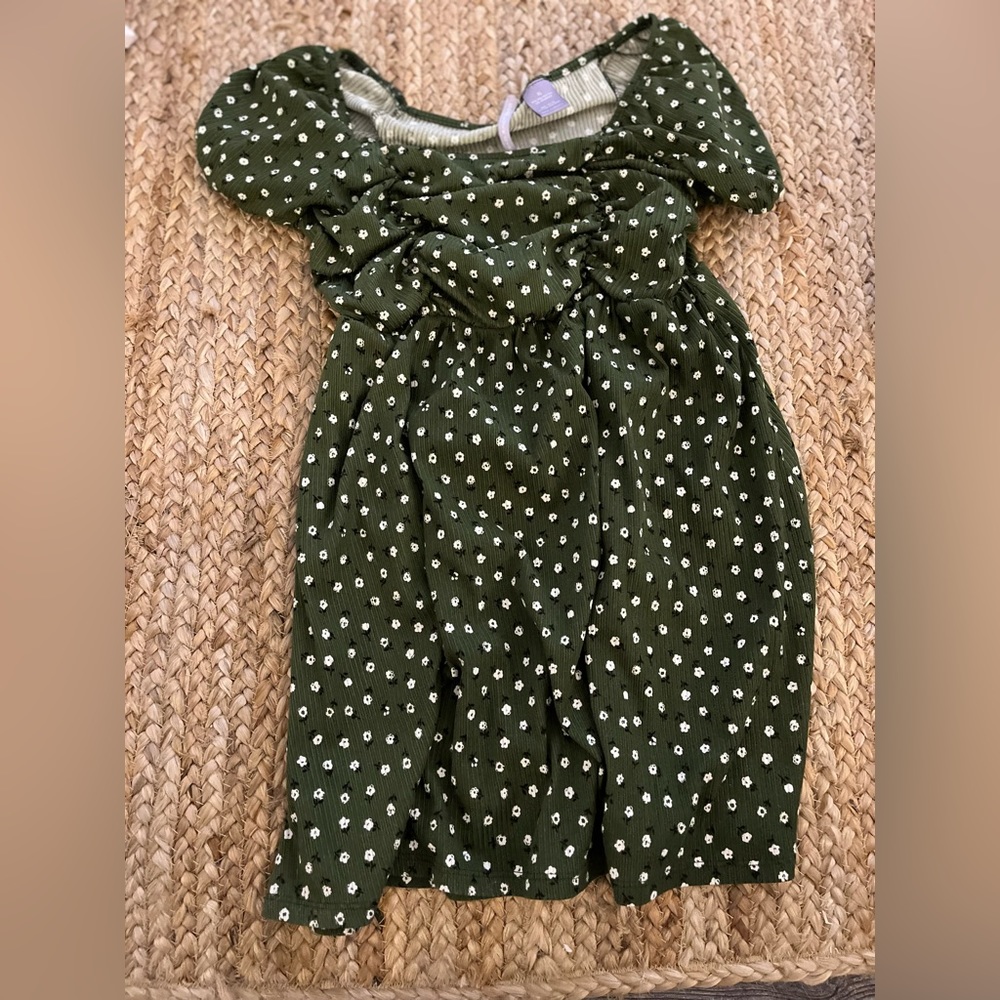 Green dress white flowers, good luck girl